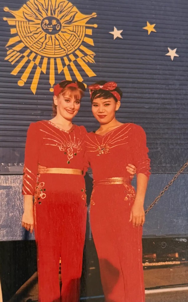 Zhao Yanyan and fellow performer in Cirque R&eacute;invent&eacute; costume